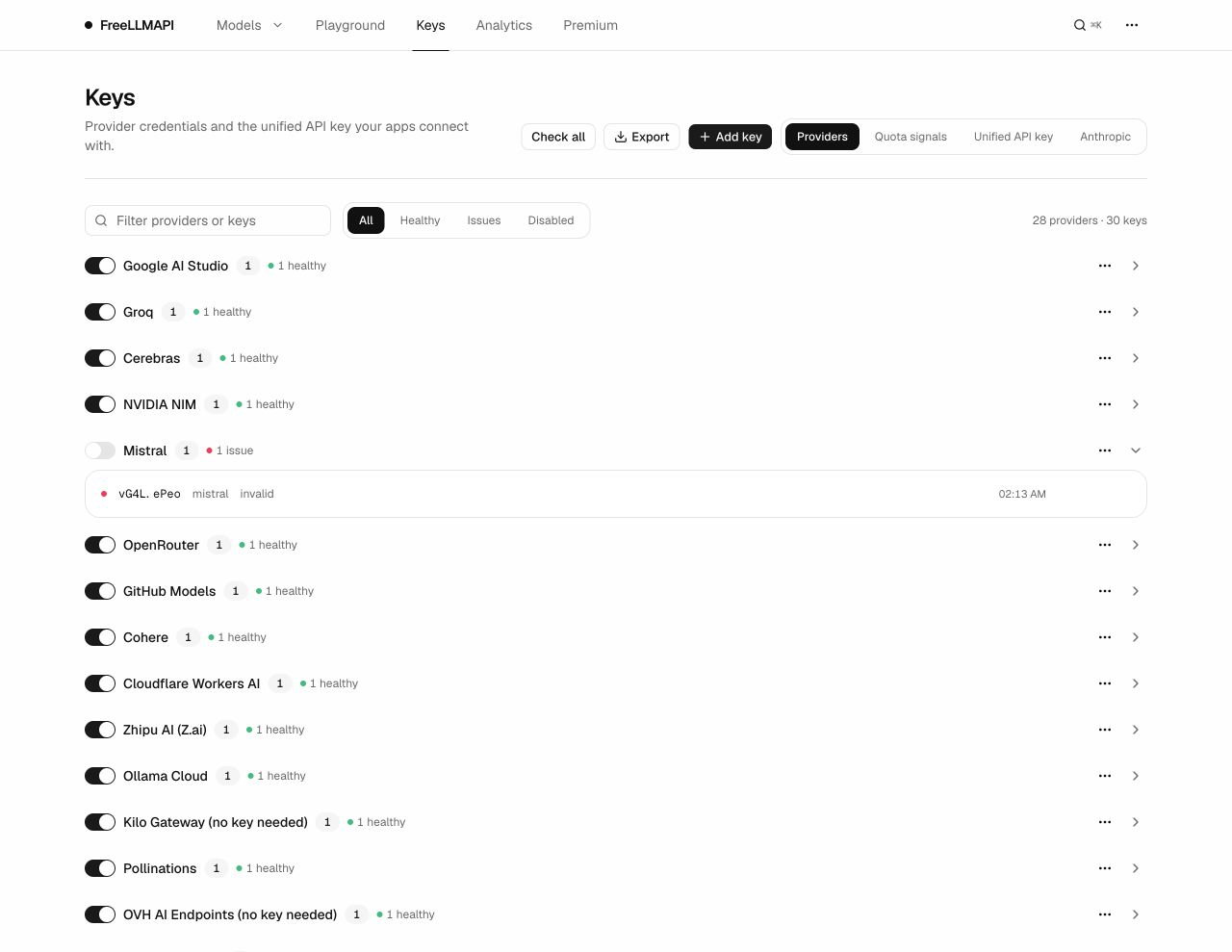图 5 Keys 面板:提供商凭证状态点、统一 API key 与健康检查记录(截图时显示 28 providers · 30 keys,界面数量为截图时状态,以实际目录为准)